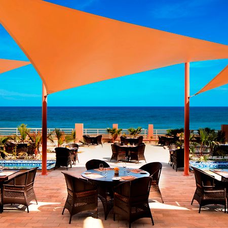 Radisson Blu Hotel & Resort, Soar Exterior foto The beach at the Sheraton Tel Aviv